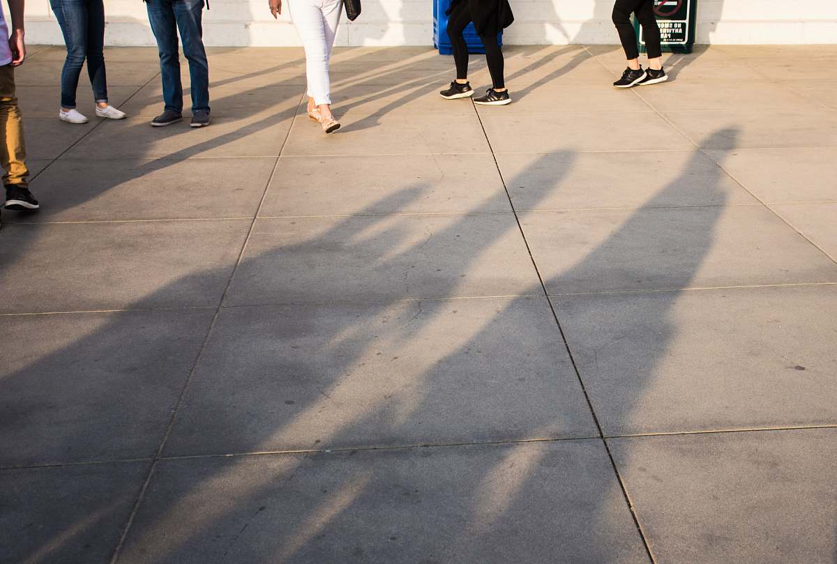 griffith observatory group of people standing on gray concrete tile flooring los angeles
